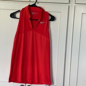 Women’s Nike golf shirt, size med